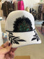Black + White Embroidered Feather Trucker Hat