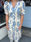 Petals in Blue Dress