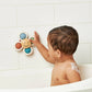 Itzy Pop & Whirl™ - Bath + Travel Toy: Smiley